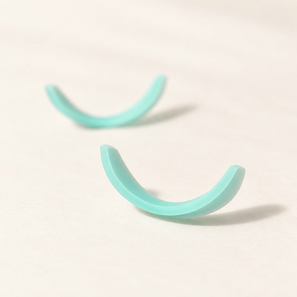 Deux pads en silicone pour rehaussement de cils, forme courbée